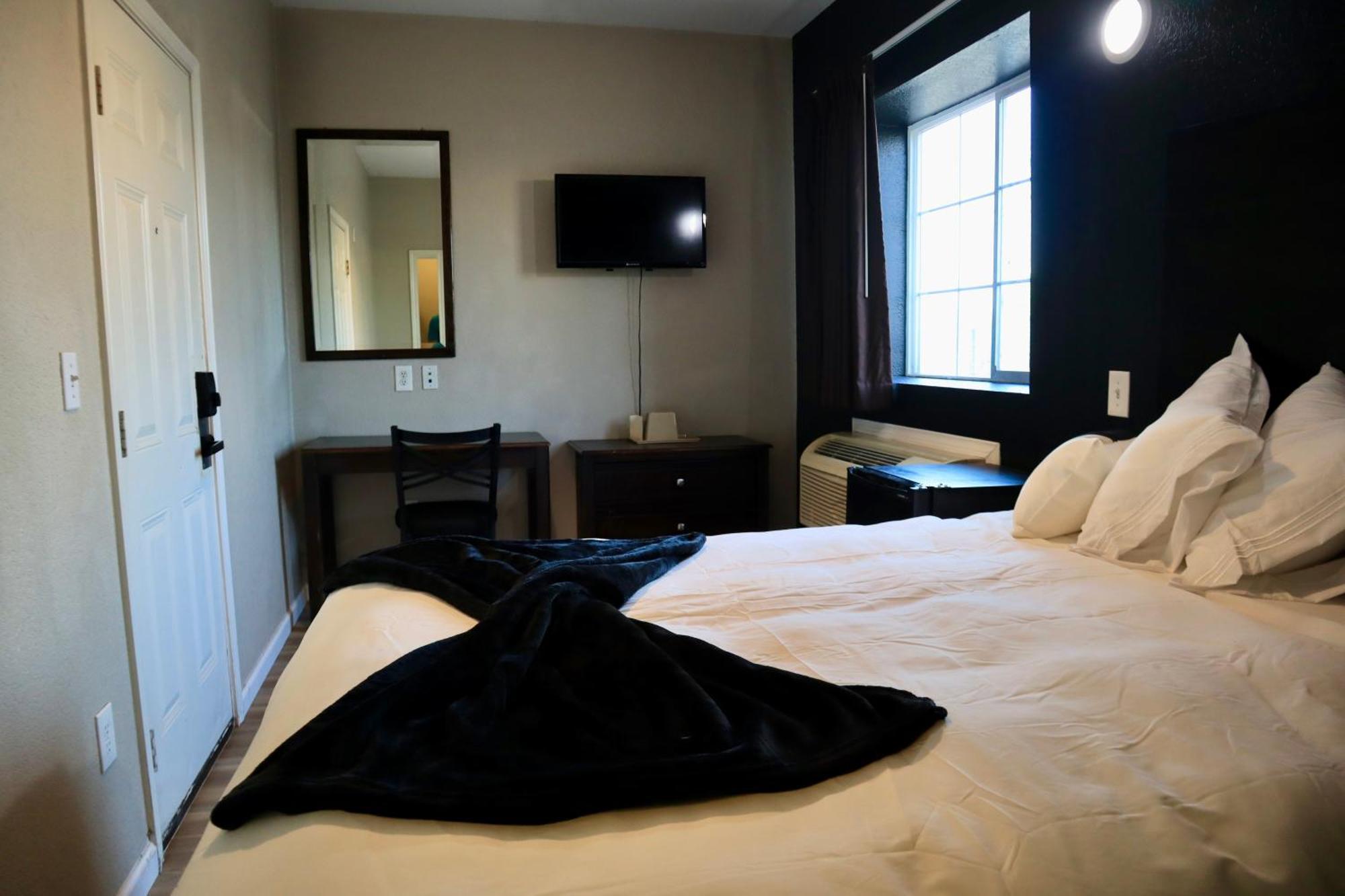 Hotel Dilley Grand Szoba fotó